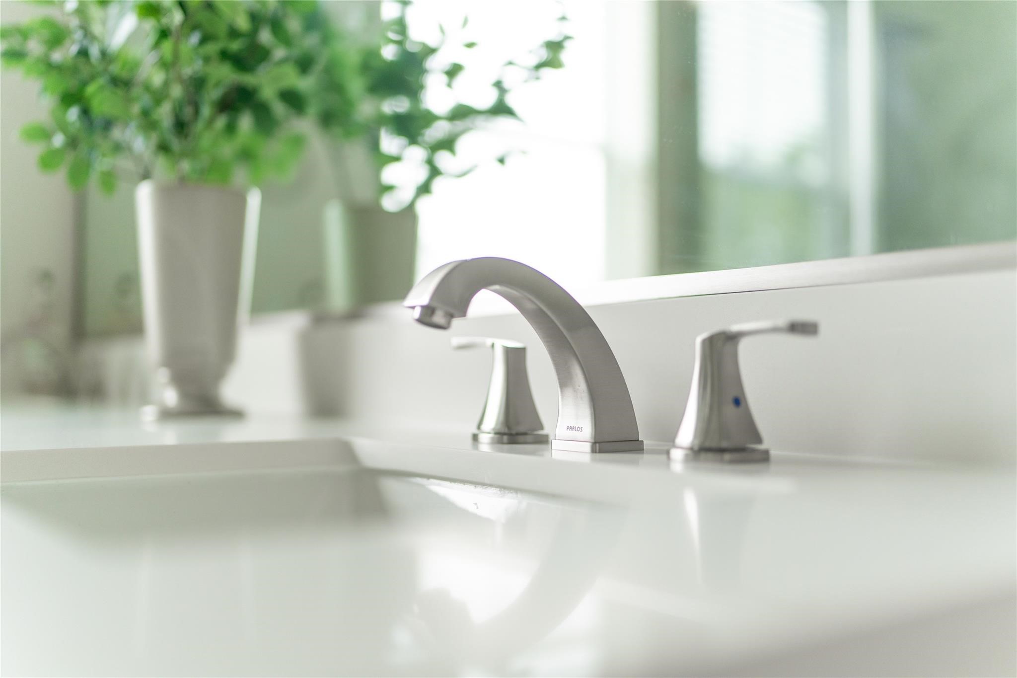 5506 Wheatley Street, Unit F Houston, TX 77091 - Photo 12 of 15 a close view of a sink a faucet a potted plant and a window