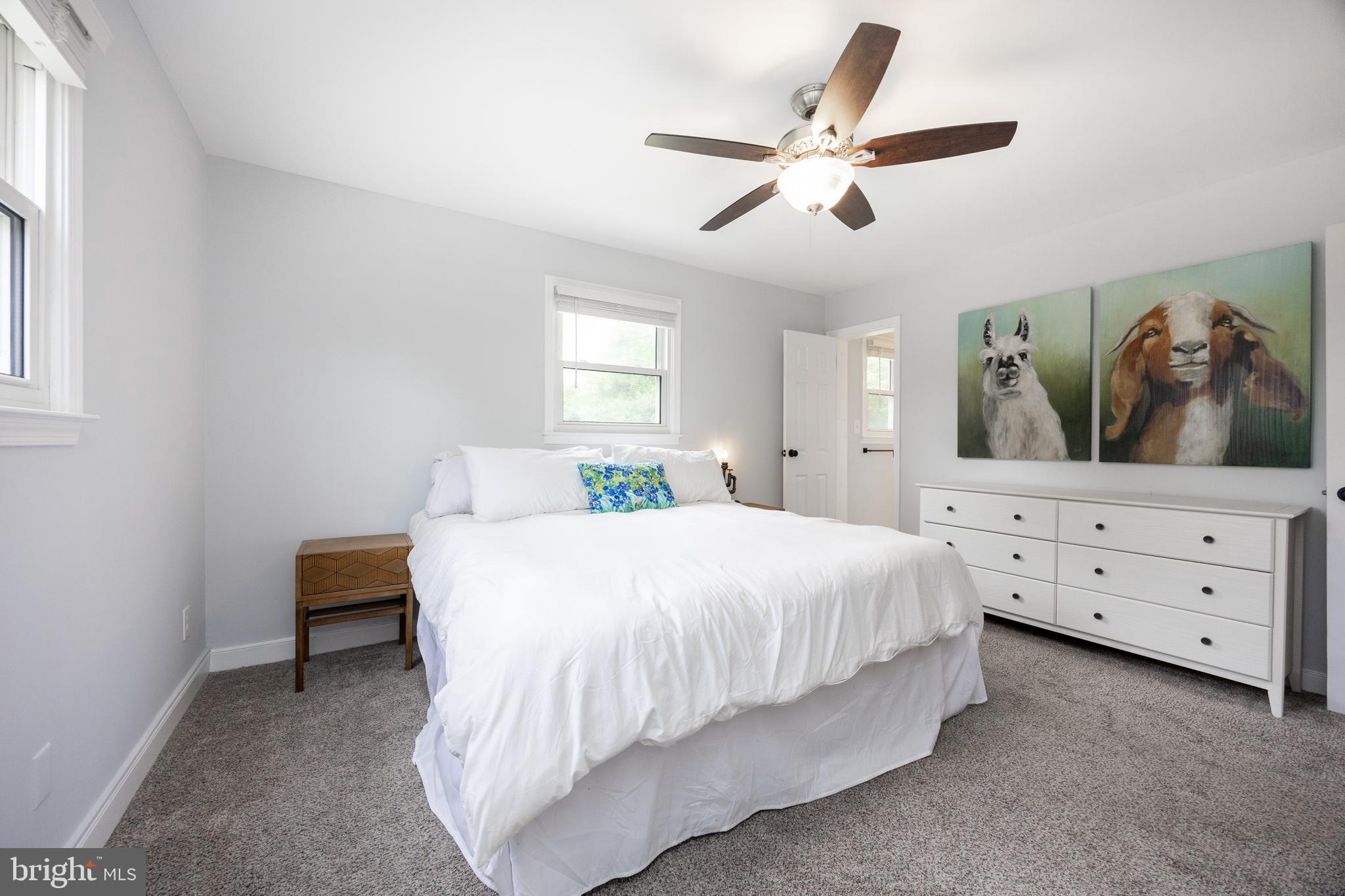 4445 Bethel Road Upper Chichester, PA 19061 - Photo 21 of 41 a bedroom with a bed and a dresser in it
