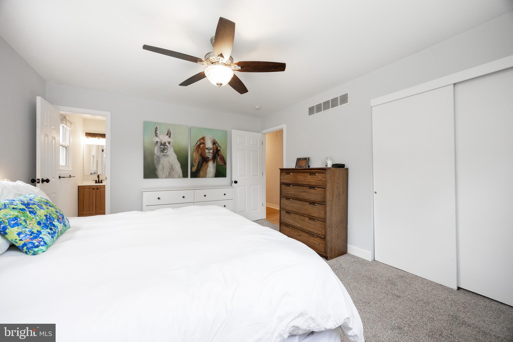 4445 Bethel Road Upper Chichester, PA 19061 - Photo 22 of 41 a bedroom with a bed and dresser