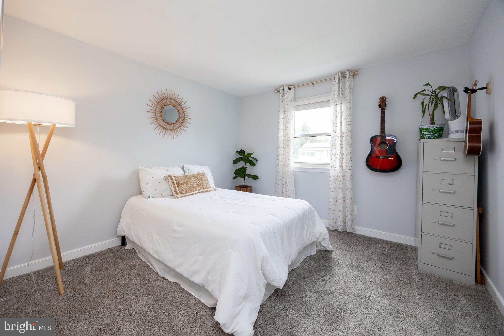 4445 Bethel Road Upper Chichester, PA 19061 - Photo 24 of 41 a bedroom with a bed and a window