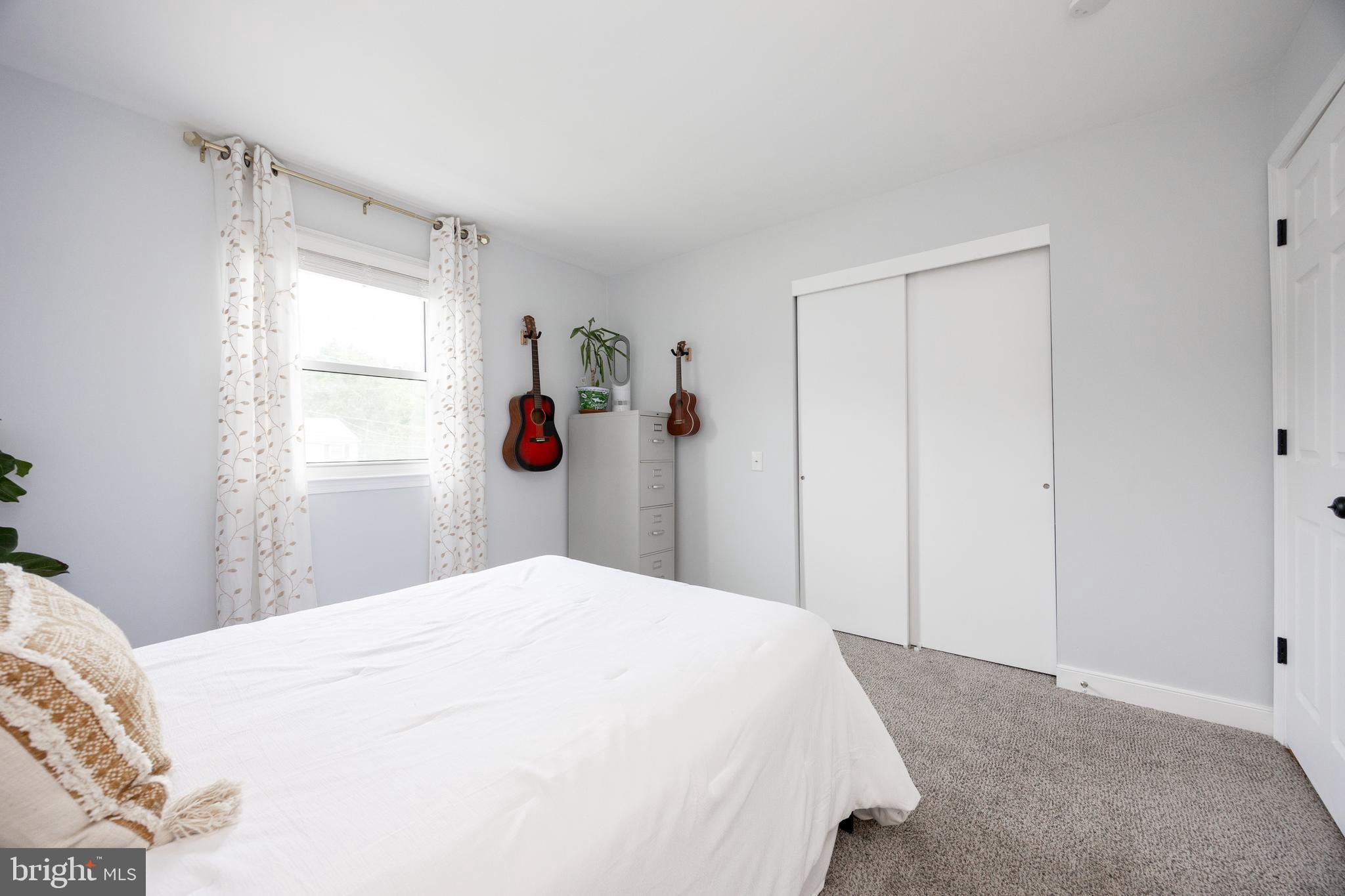 4445 Bethel Road Upper Chichester, PA 19061 - Photo 25 of 41 a bedroom with a bed and a window