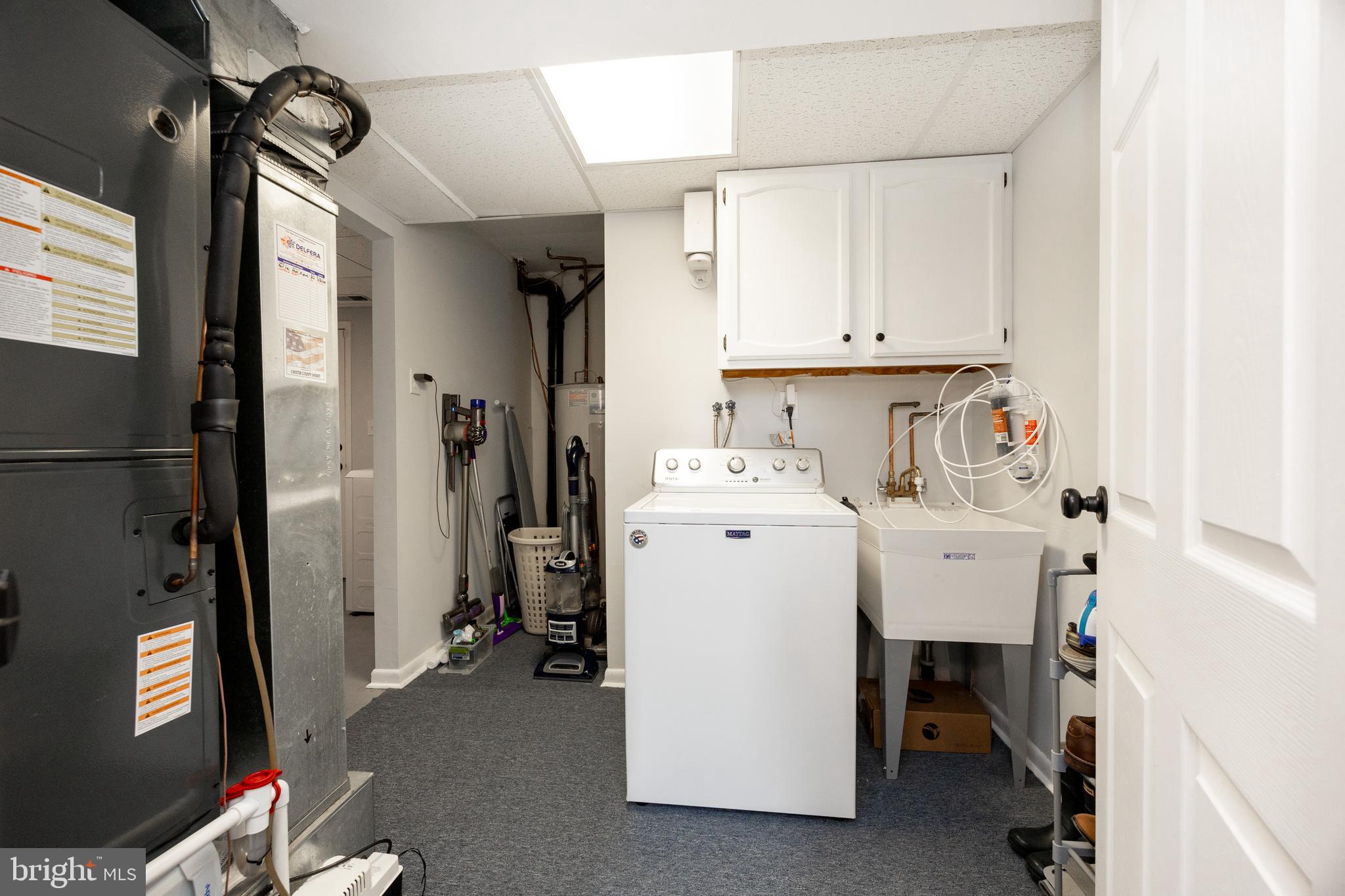 4445 Bethel Road Upper Chichester, PA 19061 - Photo 39 of 41 a utility room with closet dryer and washer