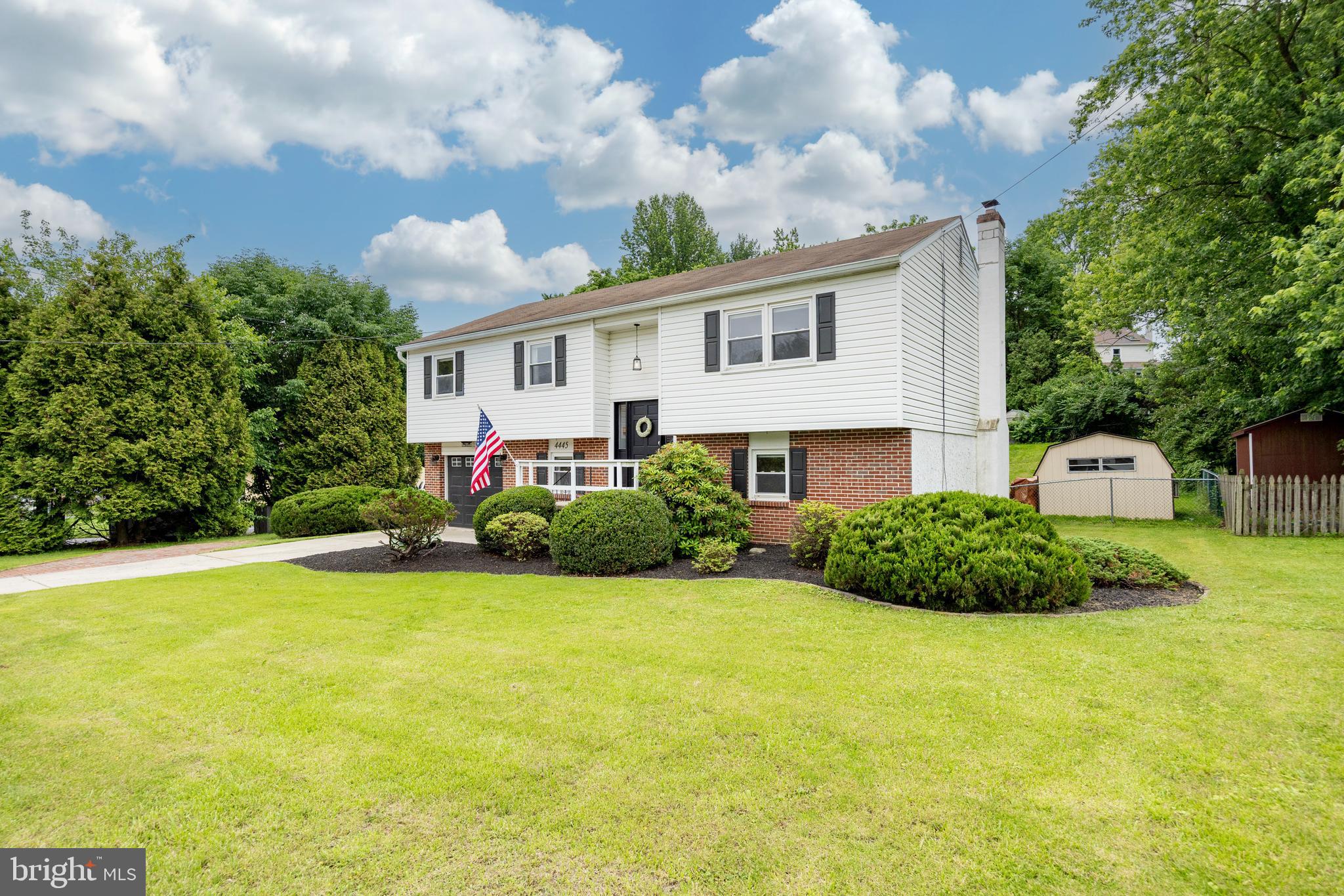 4445 Bethel Road Upper Chichester, PA 19061 - Photo 4 of 41 a front view of a house with garden