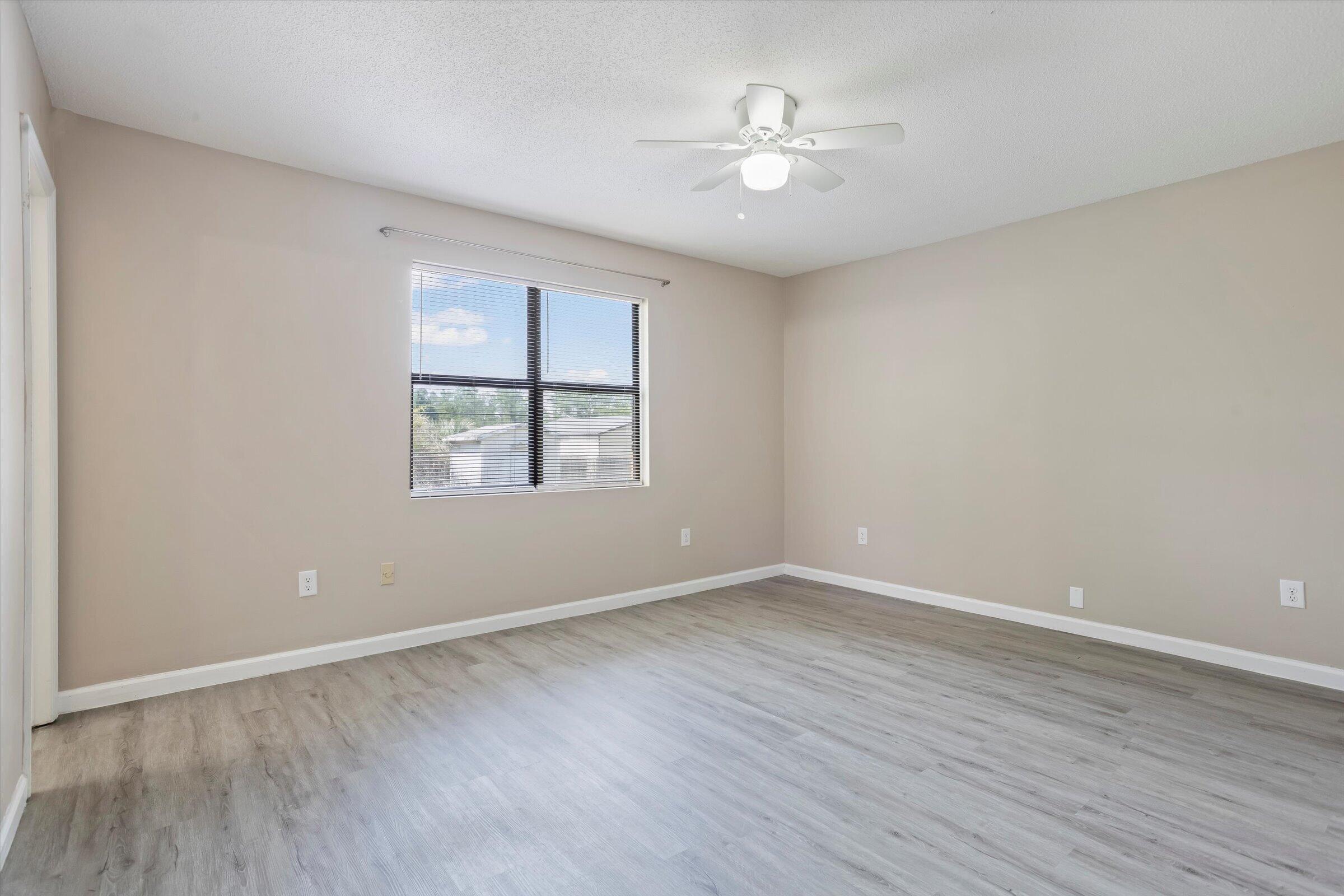 305 Manchester Court Grovetown, GA 30813 - Photo 13 of 13 a view of an empty room with windows