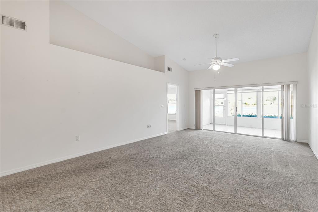 4115 Putter Place, Unit 4115 Bradenton, FL 34203 - Photo 15 of 65 a view of an empty room with a window