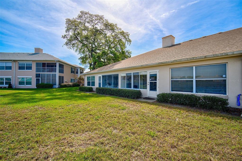 4115 Putter Place, Unit 4115 Bradenton, FL 34203 - Photo 37 of 65 a view of a house with a garden