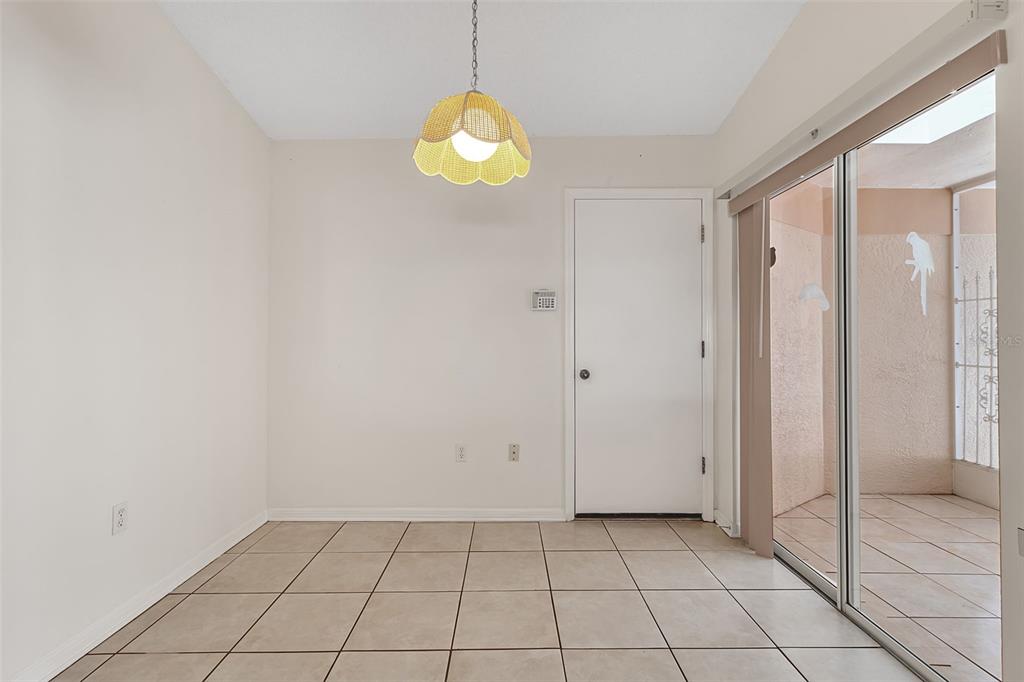 4115 Putter Place, Unit 4115 Bradenton, FL 34203 - Photo 7 of 65 a view of an empty room and window