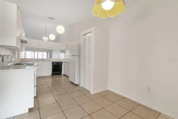 a view of a kitchen with a sink