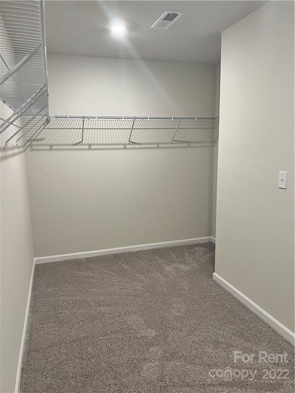 4852 Stone Drive, Unit 127 Conover, NC 28613 - Photo 16 of 34 a view of a room with racks on the wall