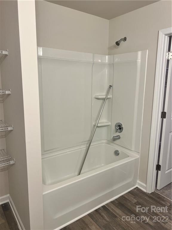 4852 Stone Drive, Unit 127 Conover, NC 28613 - Photo 30 of 34 a bathroom with a bathtub and a shower