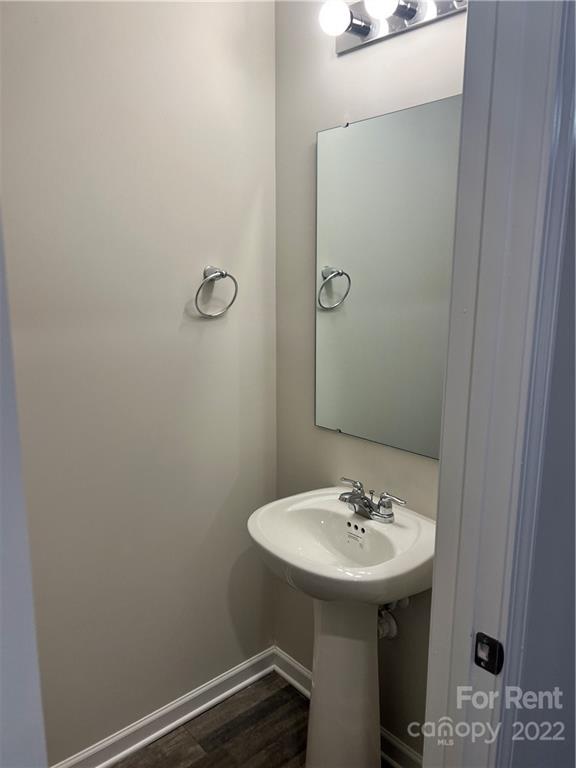 4852 Stone Drive, Unit 127 Conover, NC 28613 - Photo 4 of 34 a bathroom with a sink and a mirror