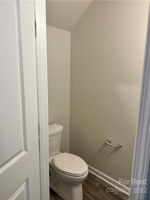 4852 Stone Drive, Unit 127 Conover, NC 28613 - Photo 5 of 34 a white toilet sitting next to a shower