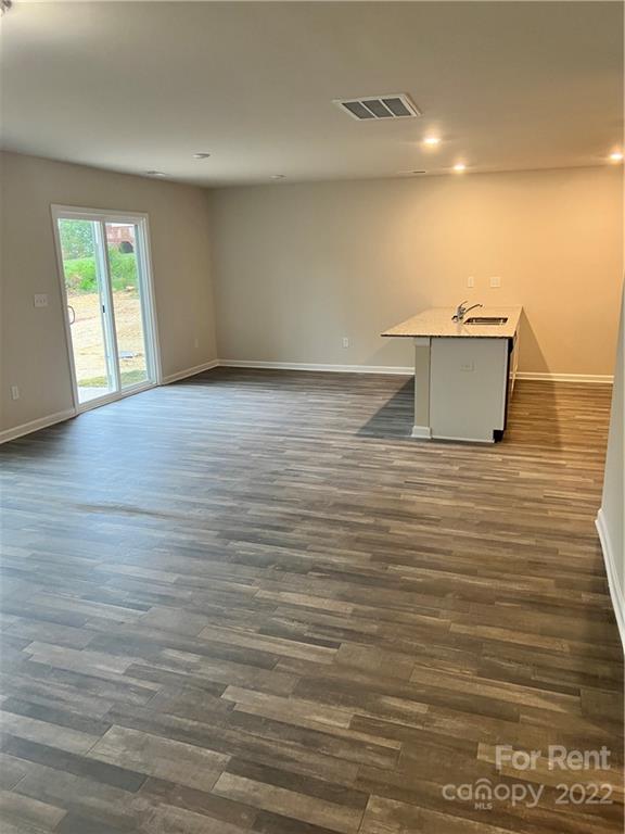 4852 Stone Drive, Unit 127 Conover, NC 28613 - Photo 6 of 34 a view of a room with wooden floor