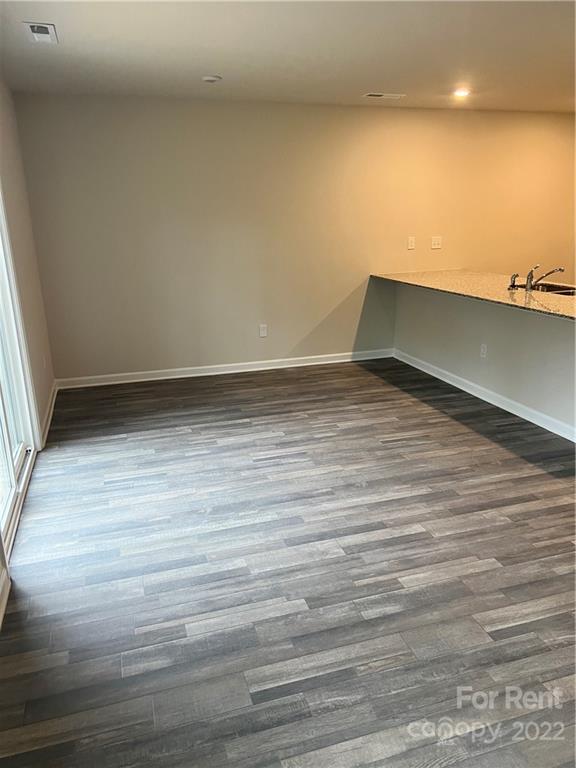 4852 Stone Drive, Unit 127 Conover, NC 28613 - Photo 7 of 34 a view of empty room with wooden floor