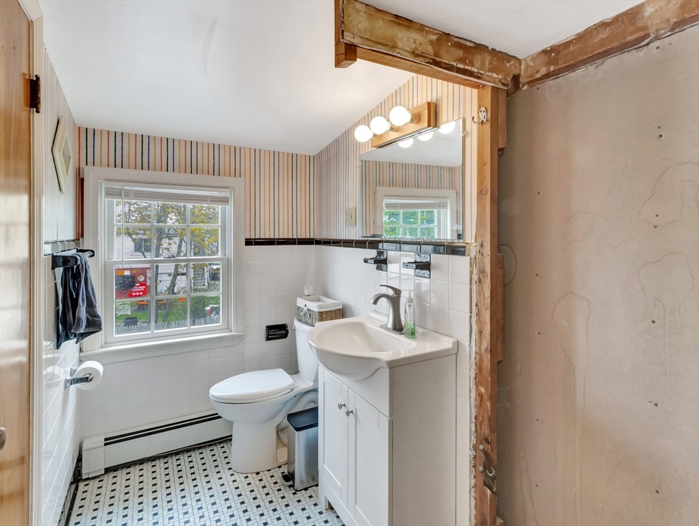 5 G Street Hull, MA 02045 - Photo 35 of 41 a bathroom with a sink toilet and shower