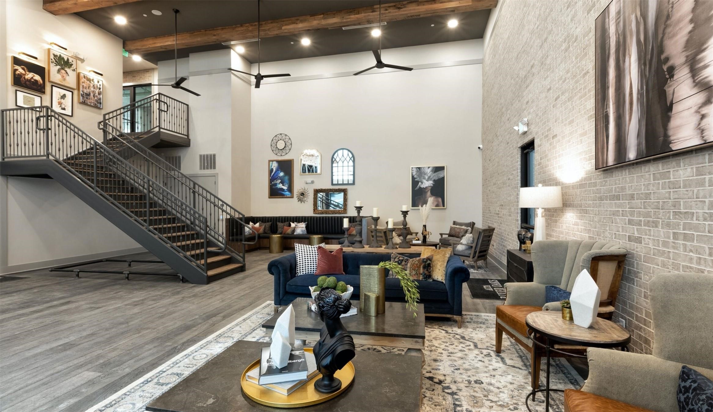 3636 West Dallas Street, Unit 511 Houston, TX 77019 - Photo 37 of 40 a living room with lots of furniture and a wooden floor