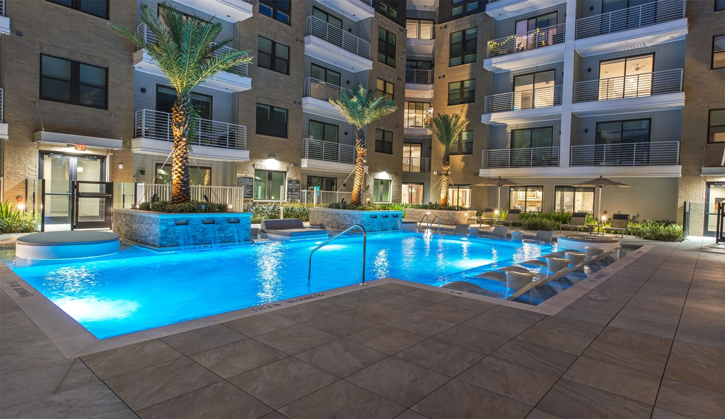 3636 West Dallas Street, Unit 511 Houston, TX 77019 - Photo 9 of 40 a view of a building with a swimming pool