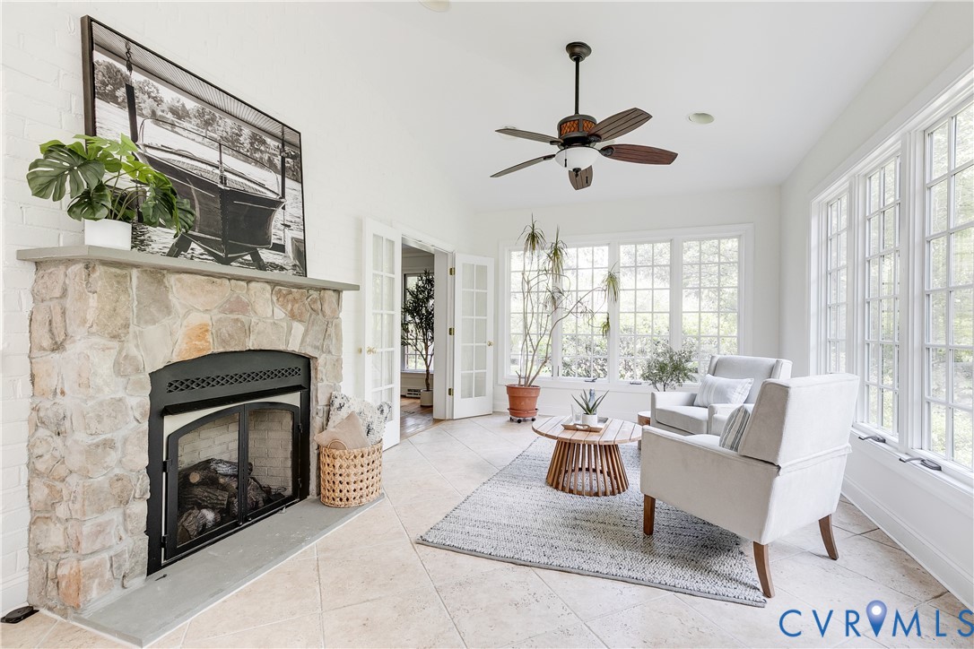 509 Wadeward Road Henrico, VA 23229 - Photo 12 of 59 a living room with furniture a window and a fireplace