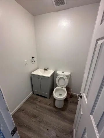 a view of a bathroom with a sink and a toilet