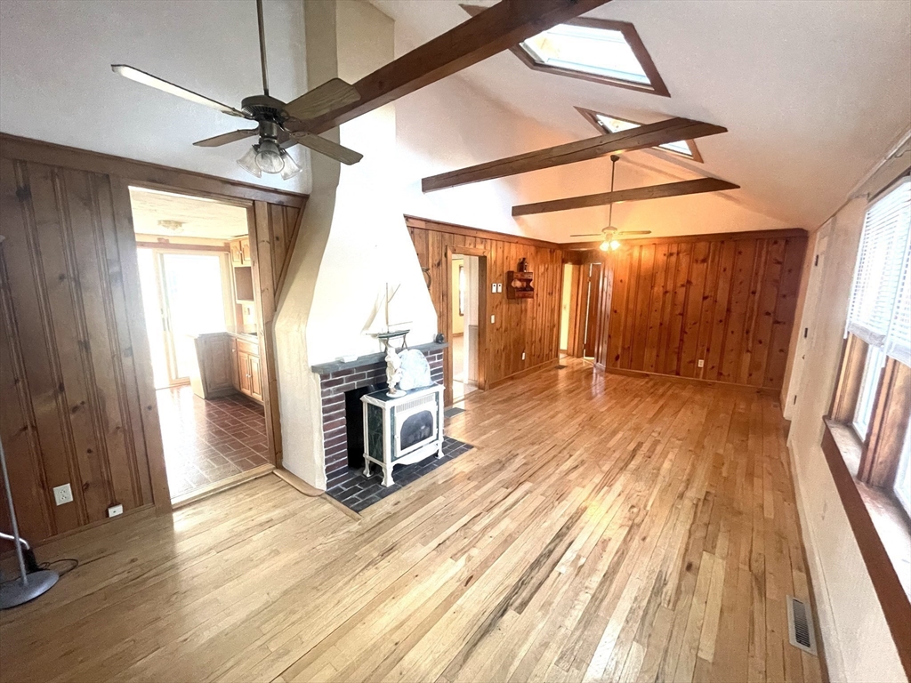 20 Postscript Lane Scituate, MA 02050 - Photo 11 of 19 a view of a room with wooden floor and windows
