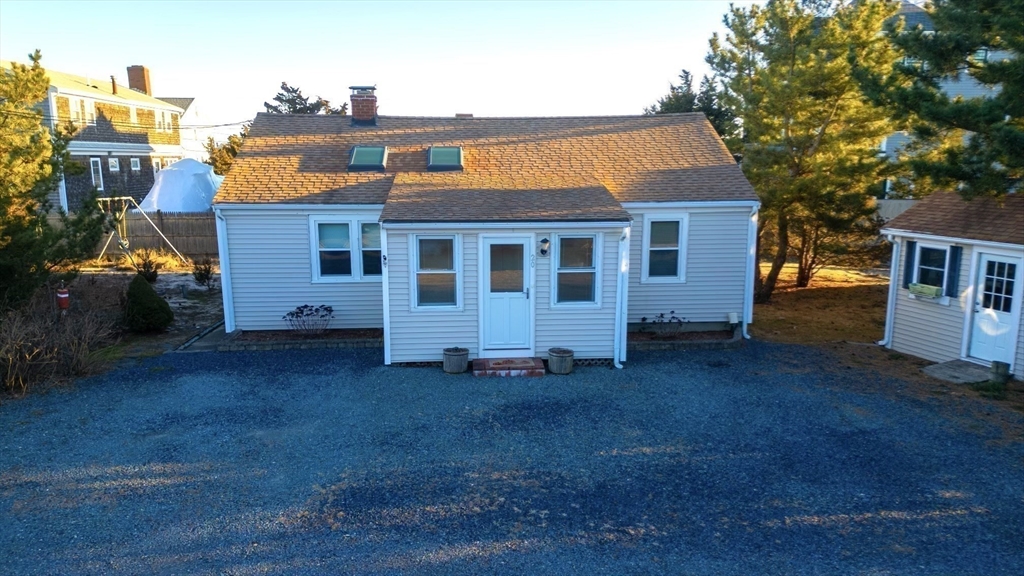 20 Postscript Lane Scituate, MA 02050 - Photo 5 of 19 a view of a house with a yard