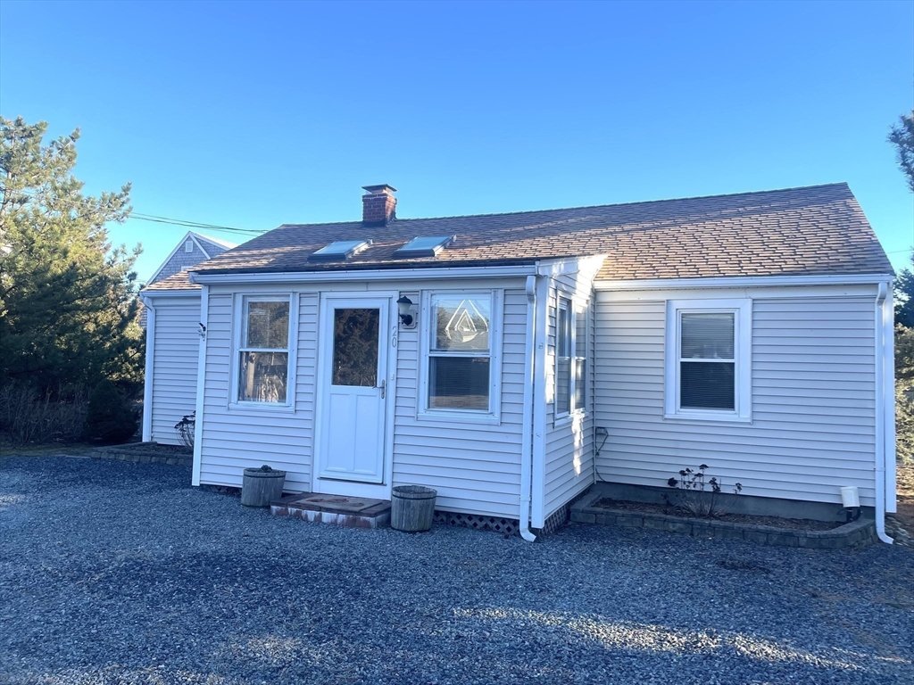 20 Postscript Lane Scituate, MA 02050 - Photo 7 of 19 a front view of a house with a yard