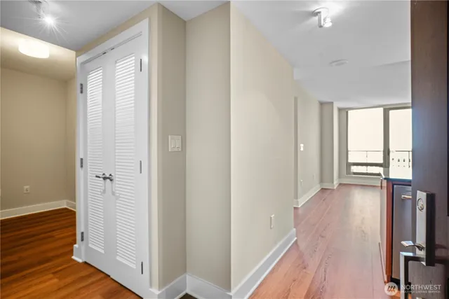 a view of entryway with wooden floor