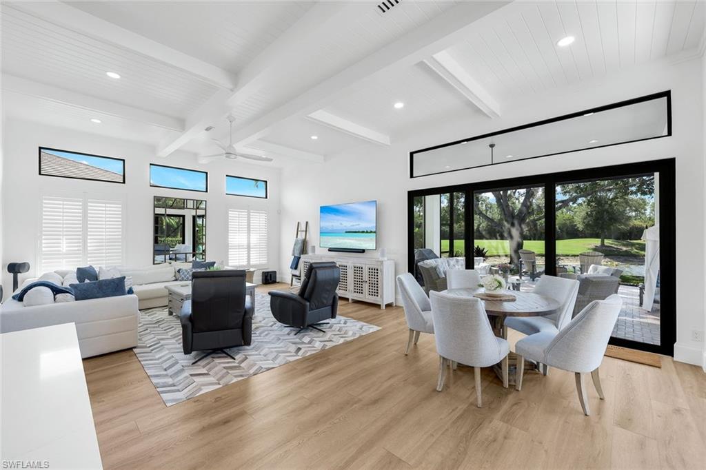 5092 Cerromar Drive Naples, FL 34112 - Photo 21 of 47 a view of a dining room with furniture window and outside view