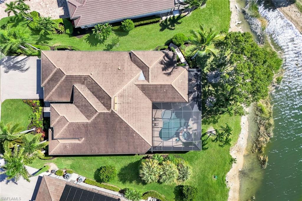 5092 Cerromar Drive Naples, FL 34112 - Photo 39 of 47 an aerial view of a house with a garden