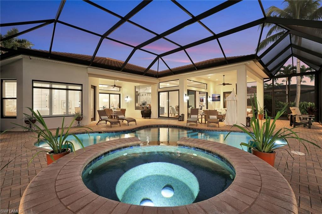 5092 Cerromar Drive Naples, FL 34112 - Photo 44 of 47 a house view with a seating space