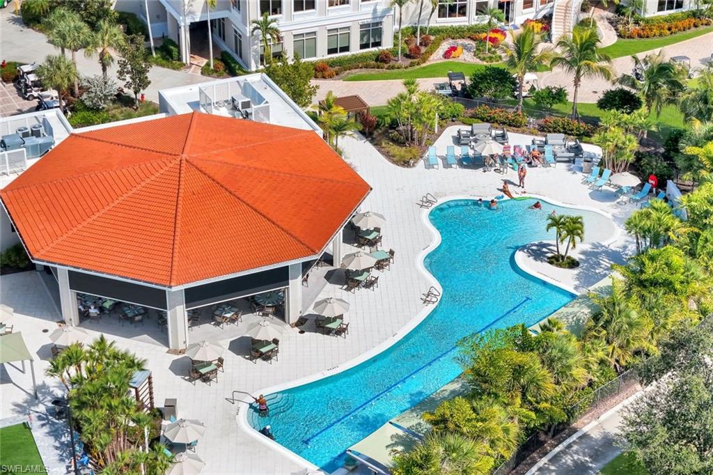 5092 Cerromar Drive Naples, FL 34112 - Photo 47 of 47 an aerial view of a house with yard