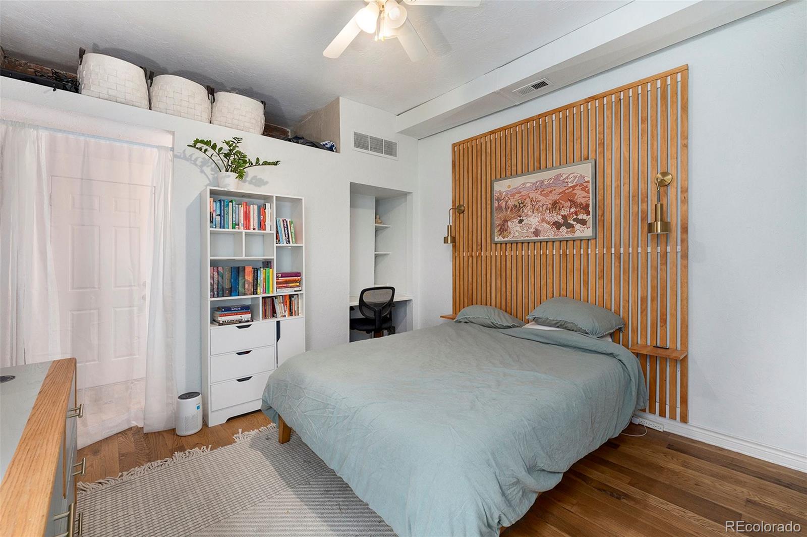 474 Inca Street Denver, CO 80204 - Photo 7 of 15 a bedroom with a bed and a window