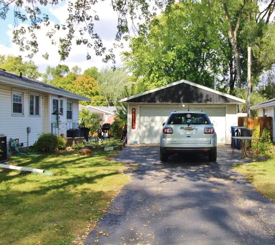 a car parked in front of a house