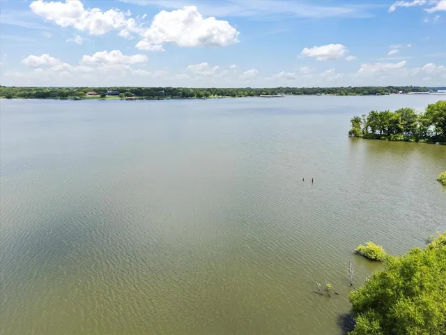 a view of a lake from a yard