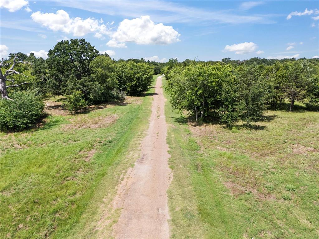 11656 Farm To Market Road 751 Wills Point, TX 75169 - Photo 6 of 25 a view of a pathway both side of yard