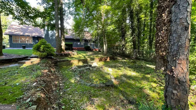 a backyard of a house with seating space
