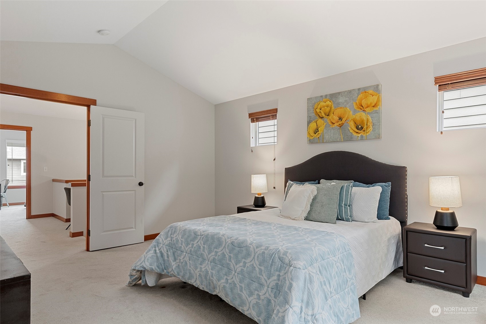 4518 147th Place Southeast Bothell, WA 98012 - Photo 20 of 36 a bedroom with a bed and painting on the wall