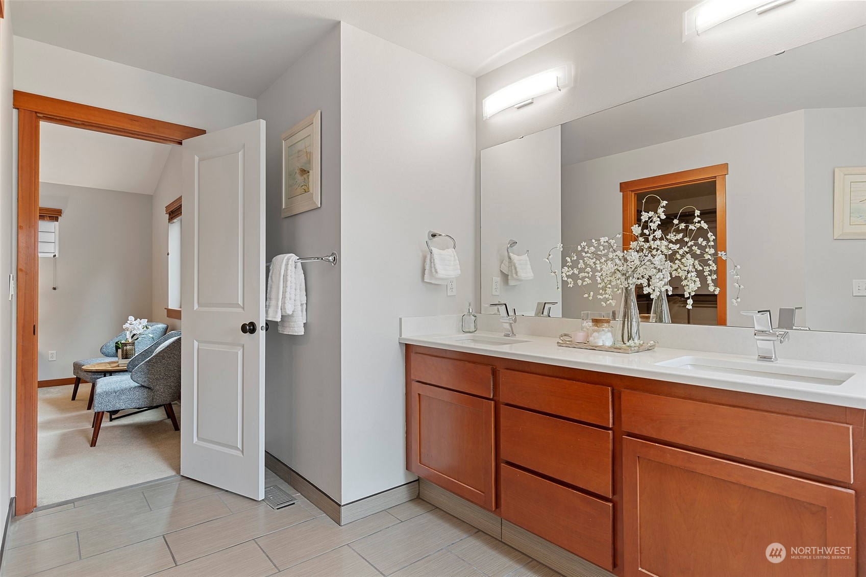 4518 147th Place Southeast Bothell, WA 98012 - Photo 23 of 36 a en suite bathroom with a double vanity sink and a mirror