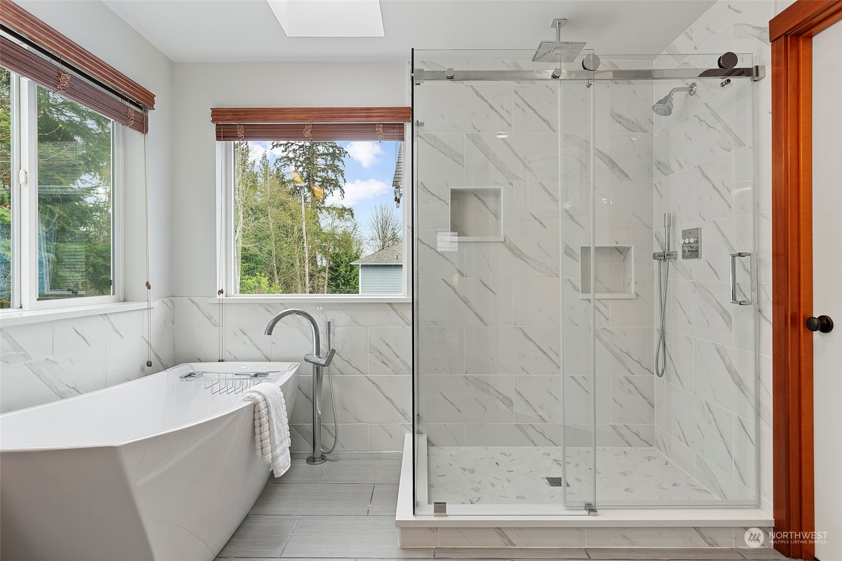 4518 147th Place Southeast Bothell, WA 98012 - Photo 24 of 36 a bathroom with a bathtub and shower