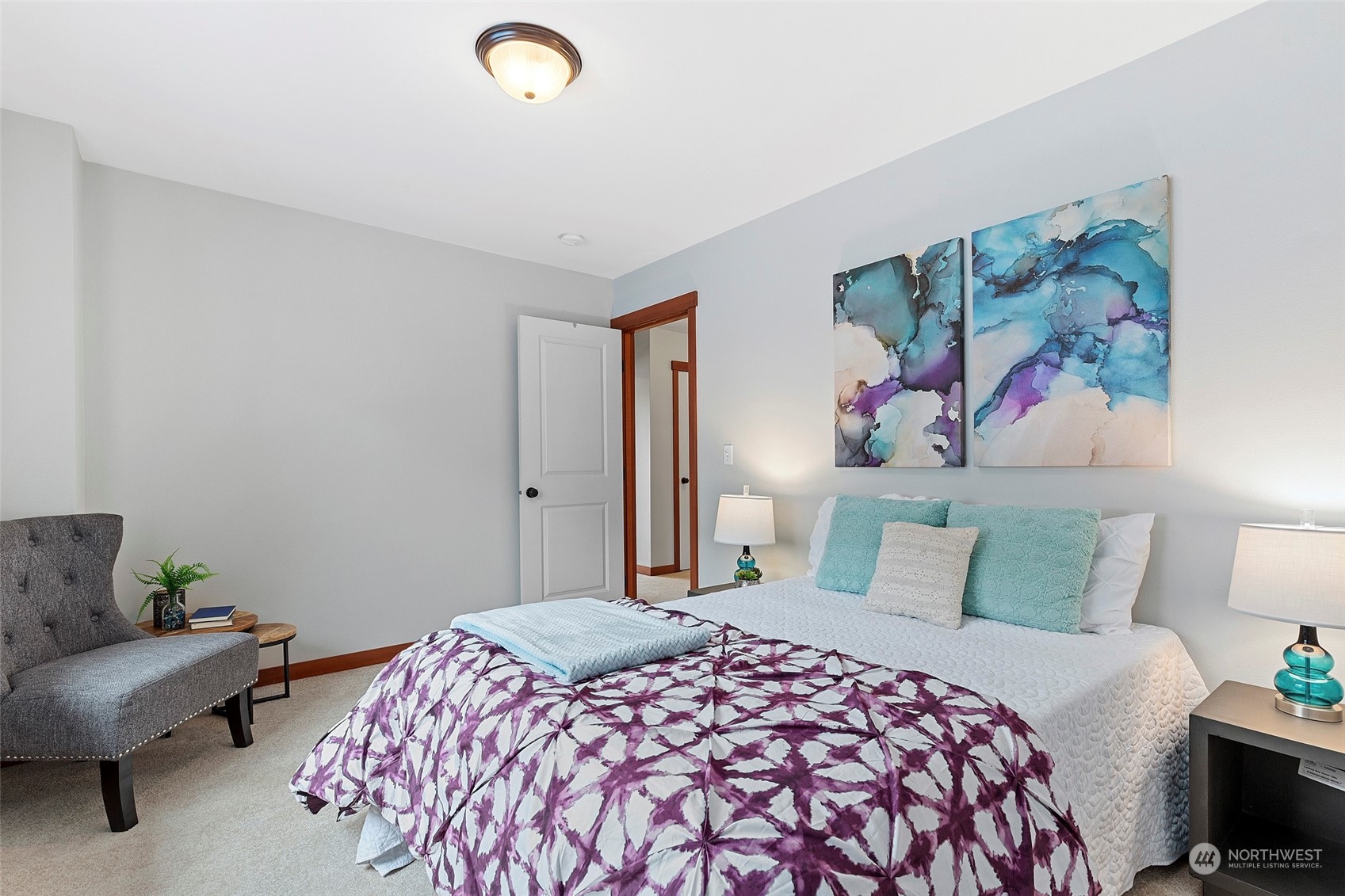 4518 147th Place Southeast Bothell, WA 98012 - Photo 28 of 36 a bedroom with a bed and a couch