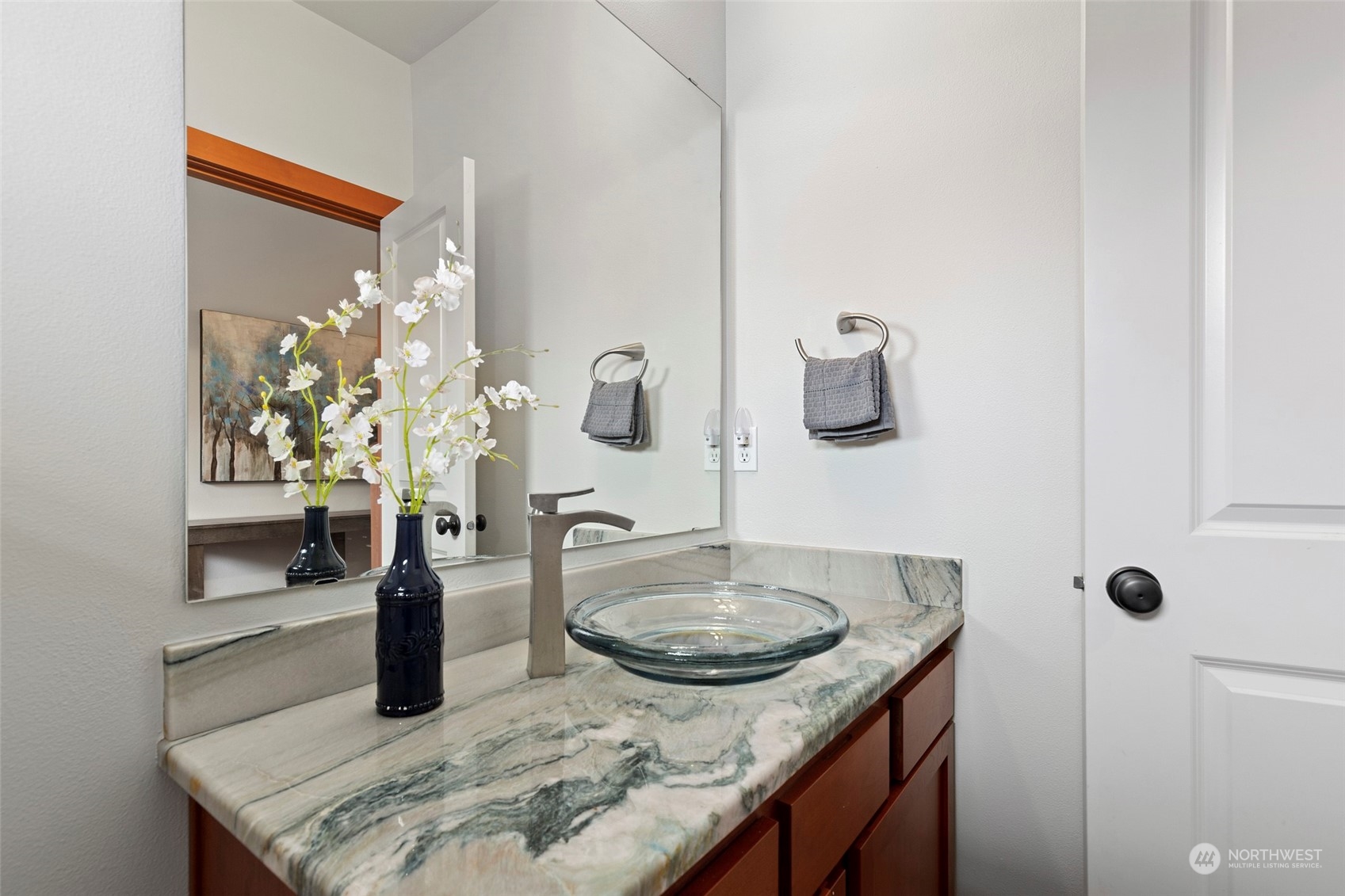 4518 147th Place Southeast Bothell, WA 98012 - Photo 6 of 36 a bathroom with a sink and a mirror