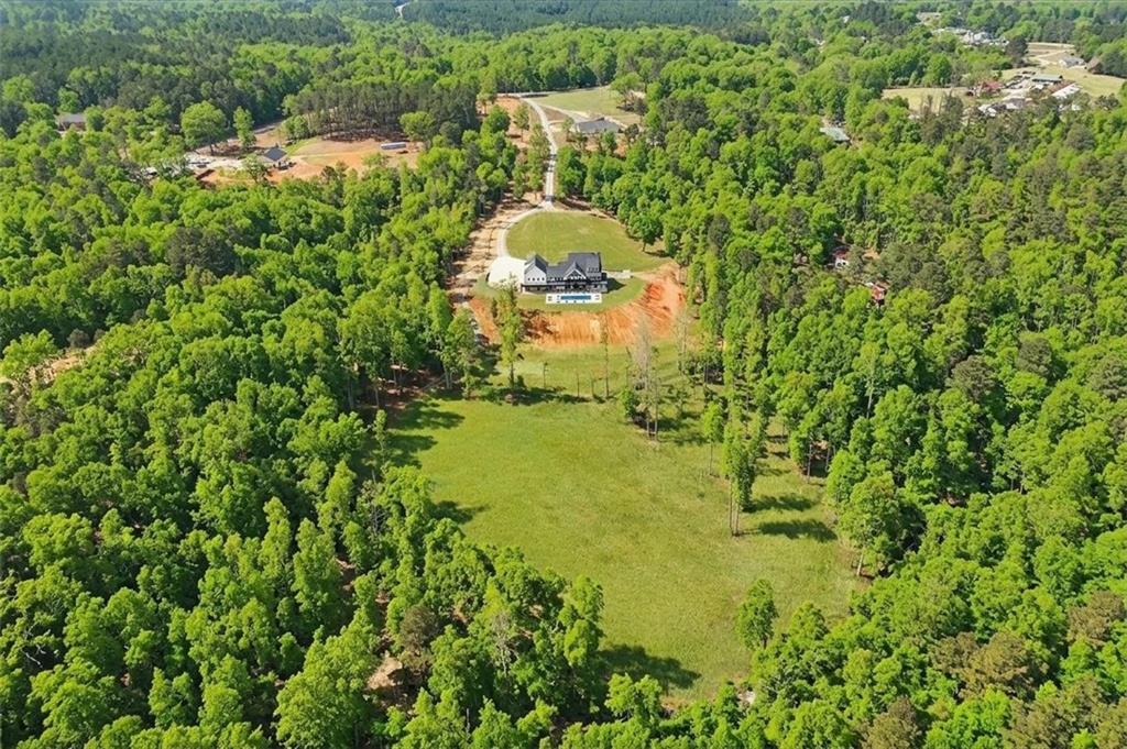 1100 Soap Creek Road Ball Ground, GA 30107 - Photo 2 of 107