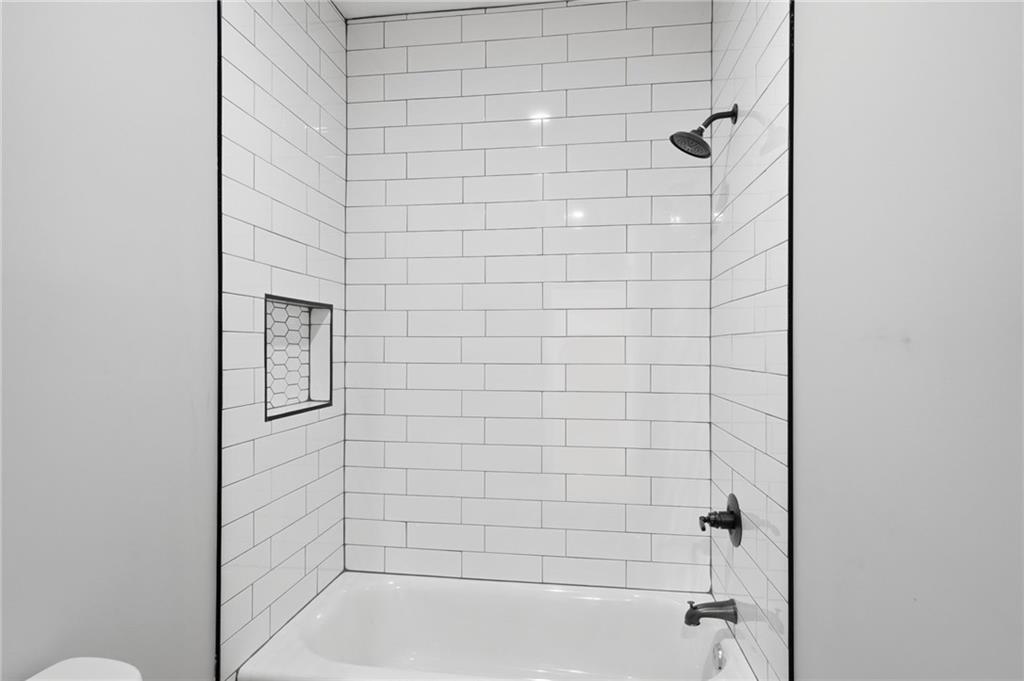 1100 Soap Creek Road Ball Ground, GA 30107 - Photo 50 of 107 a bathroom with a shower