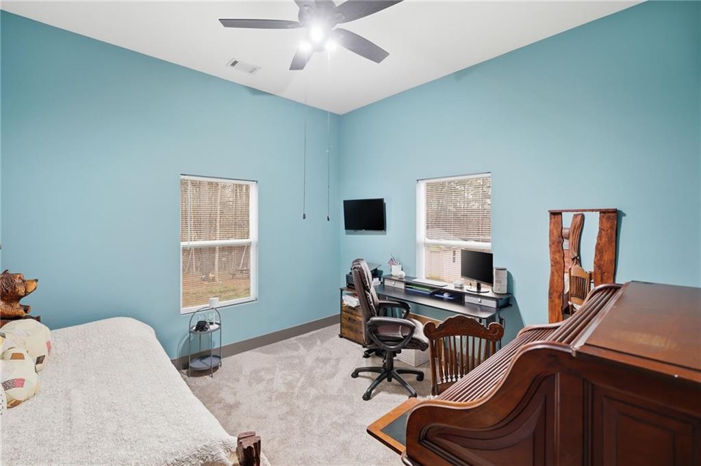 1100 Soap Creek Road Ball Ground, GA 30107 - Photo 95 of 107 a view of a workspace with furniture and a window