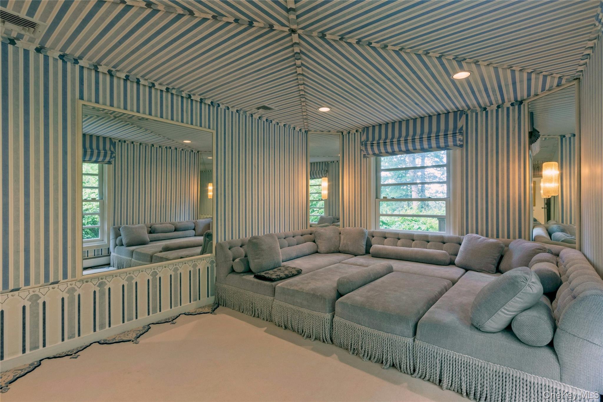 94 Cliff Road Tuxedo Park, NY 10987 - Photo 17 of 37 a living room with furniture and a large window