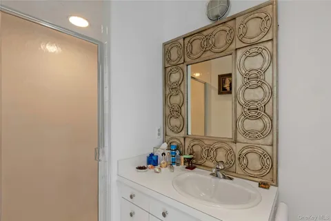 a view of a house with a tree in the background