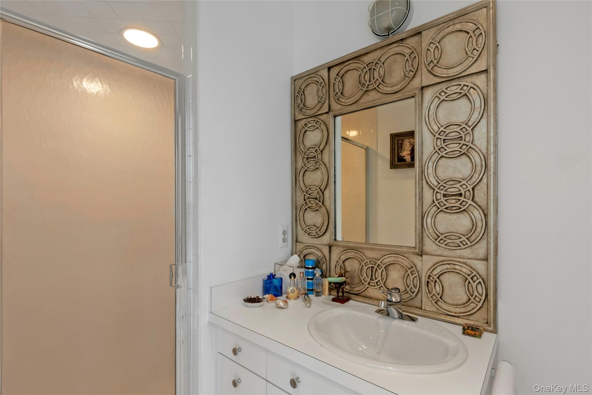 94 Cliff Road Tuxedo Park, NY 10987 - Photo 18 of 37 Bathroom with a shower stall and vanity