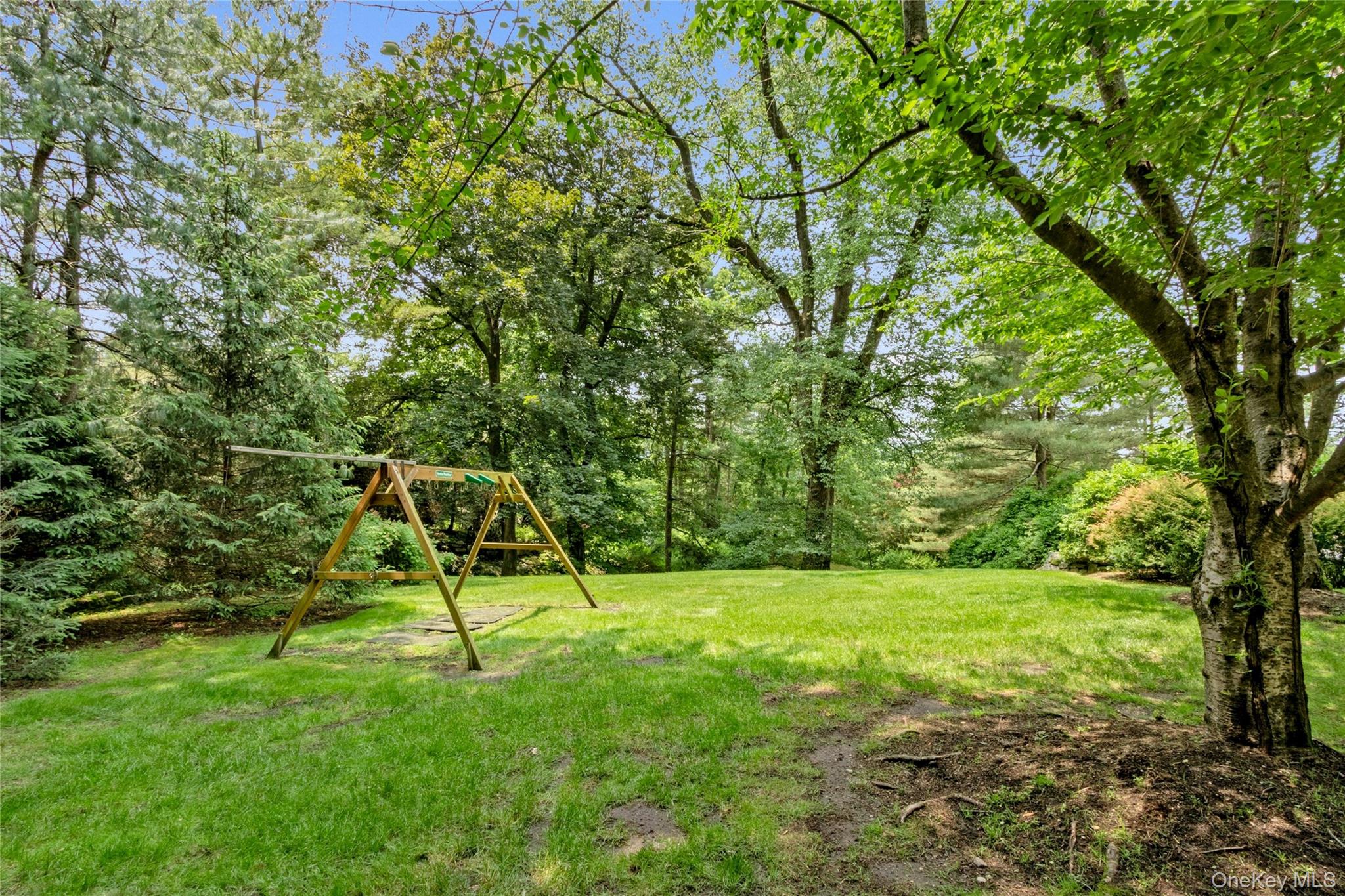 94 Cliff Road Tuxedo Park, NY 10987 - Photo 32 of 37 a view of a park with a tree