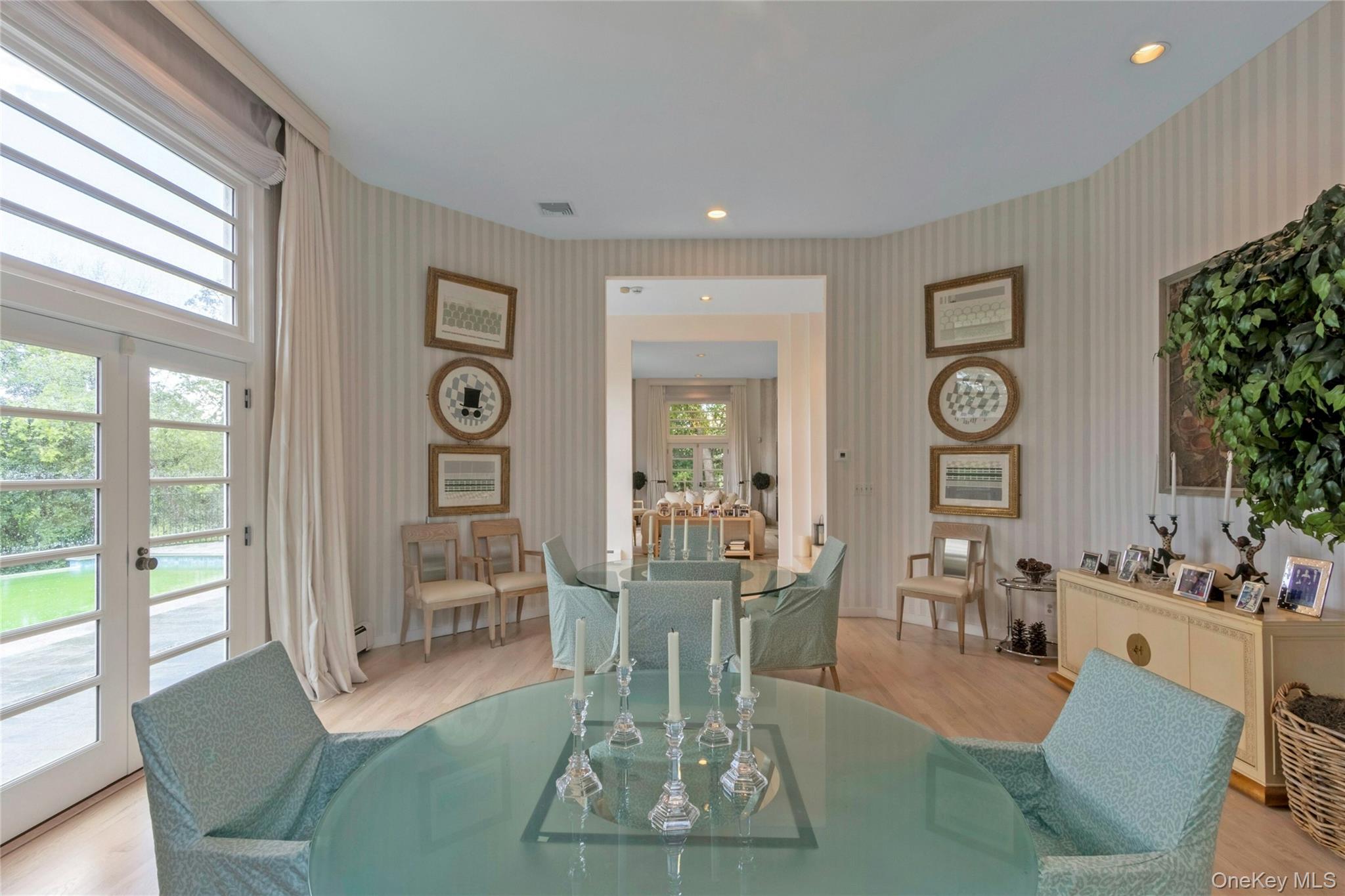 94 Cliff Road Tuxedo Park, NY 10987 - Photo 9 of 37 a living room with furniture a large window and wood floor