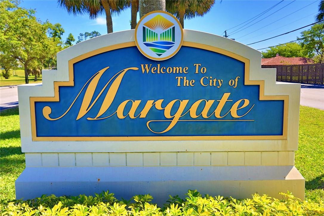 6960 Southwest 1st Street Margate, FL 33068 - Photo 2 of 36 a view of a street sign
